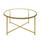 Round Metal Coffee Table With Glass Top and X Shape Base, Gold and Clear