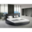 Queen size Modern Round Platform Bed with Headboard in Black Faux Leather